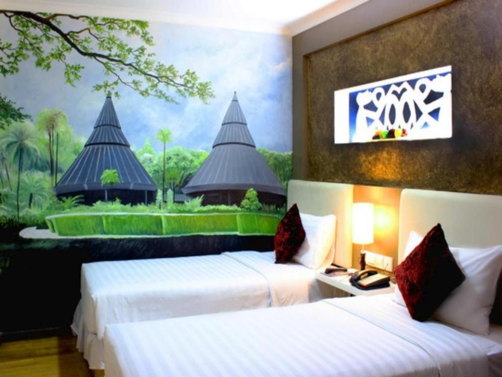 Amos Cozy Hotel Melawai Jacarta Exterior foto