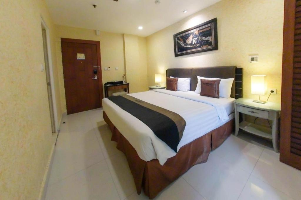 Amos Cozy Hotel Melawai Jacarta Exterior foto