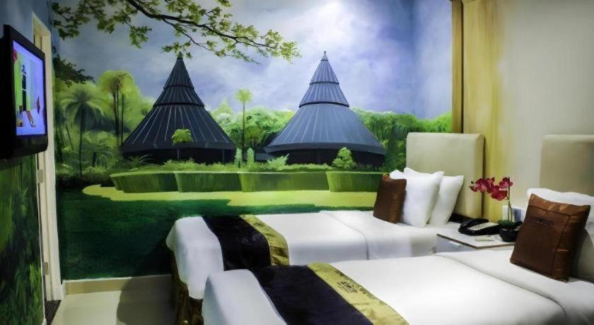 Amos Cozy Hotel Melawai Jacarta Exterior foto